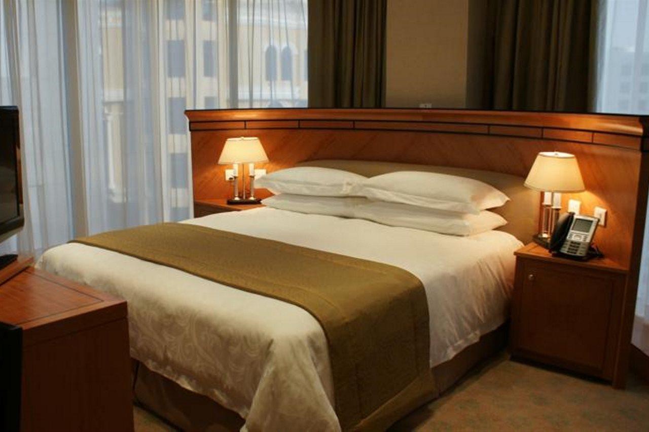 Wiseman Grand Hotel 多哈 外观 照片 A bed